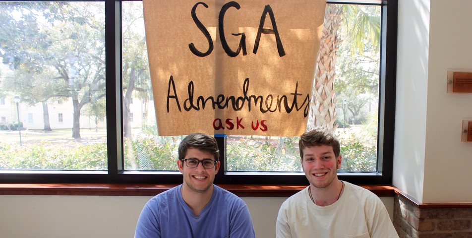 Kate Huete: SGA members Ryan Ankerson and Adam Schmitt sit at the back of the student center to answer questions.