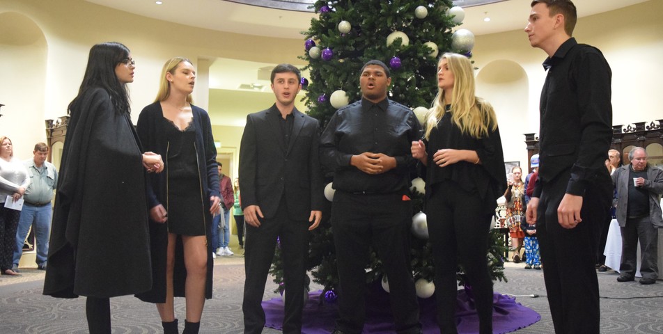 Hannah Martin: Members of the Upper Room Acapella group perform at the lighting of Spring HIll's Christmas tree.