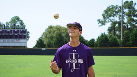 Pitcher Christian Long tosses a baseball before practice. (photo: Kayley Robinson)