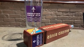 Portier Pale Ale glass and Tap Handle (photo: Spring Hill College Marketing Department)