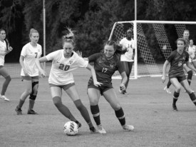 Lady Badgers playing in their match against Valdosta State on the Library Field (photo: Natalie Williamson)